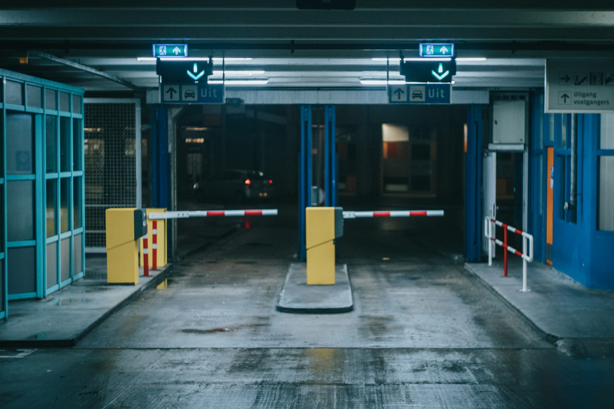 Parking garage entrance with barrier gates